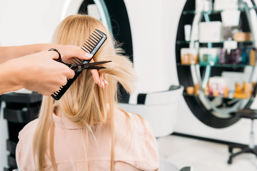 cropped image of hairdresser trimming ends of hair 2022 12 16 21 05 17 utc cropped image of hairdresser trimming ends of hair 2022 12 16 21 05 17 utc